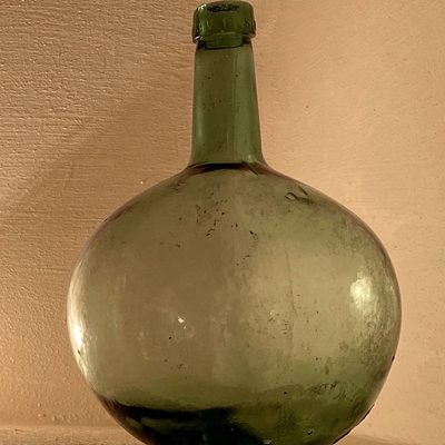 A 5-gallon glass carboy